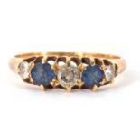 Sapphire and diamond ring, alternate set with two round cut sapphires and three graduated small
