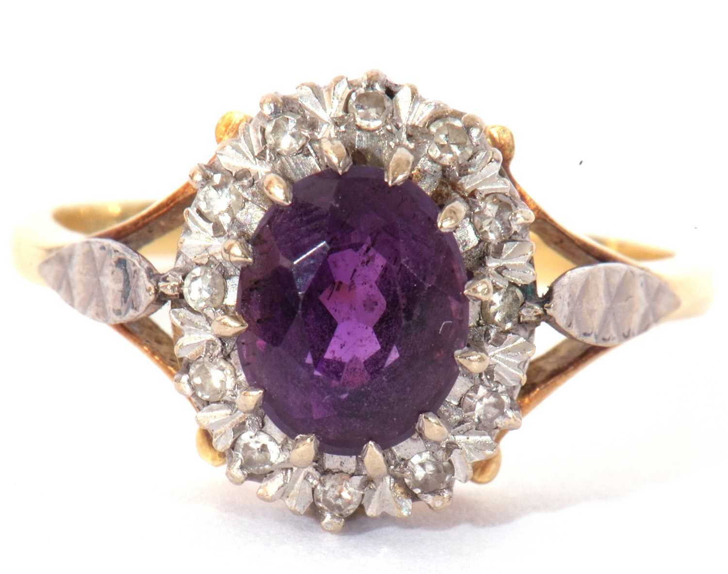 Amethyst and diamond cluster ring, the oval faceted amethyst raised within a small single cut - Image 2 of 9