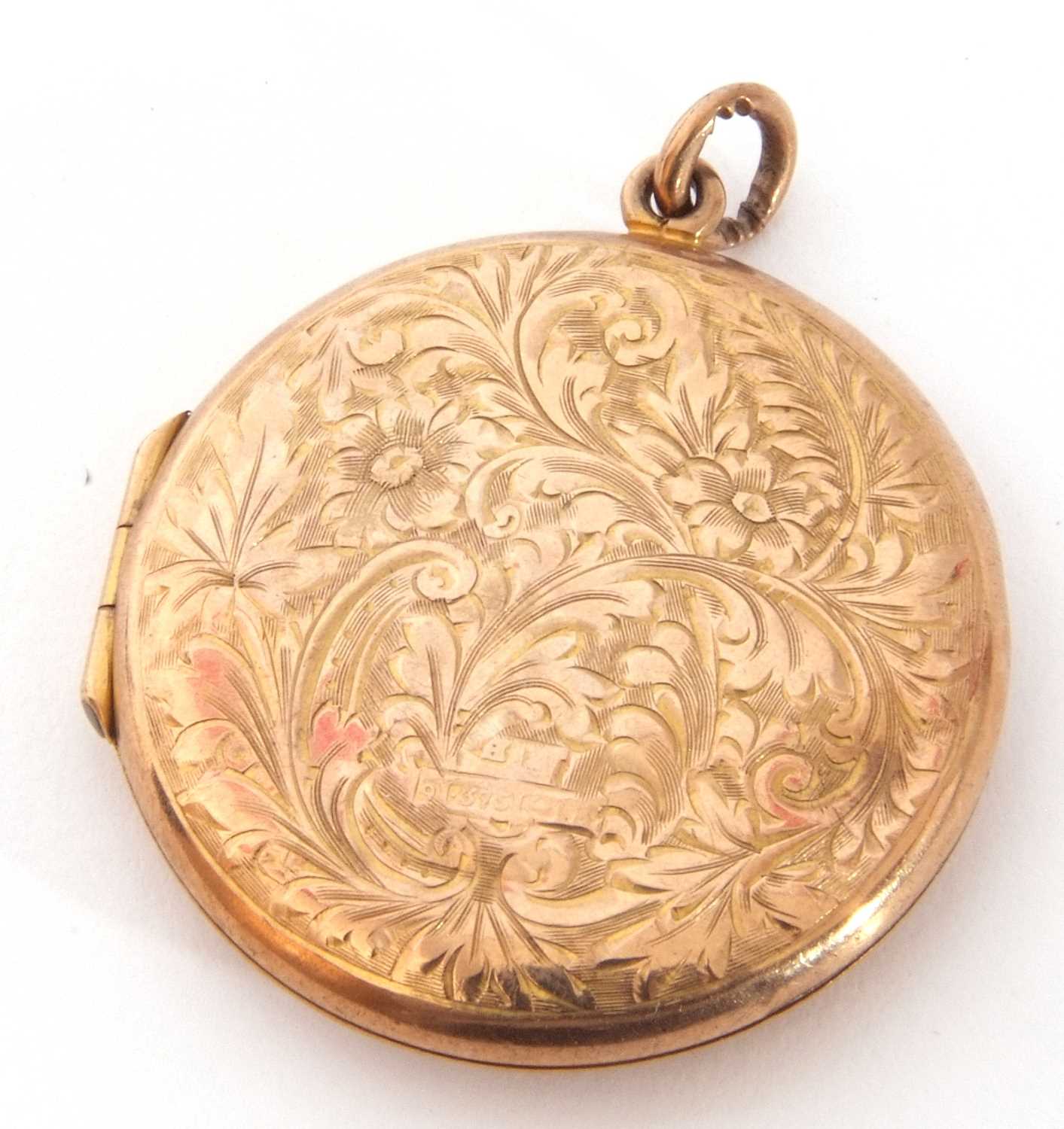 Hallmarked 9ct gold circular hinged locket, chased and engraved overall with scrolls etc, the - Image 2 of 3