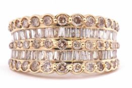 Modern 14K stamped diamond cluster ring, design featuring two bands of graduated baguette diamonds