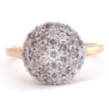 Modern 9ct gold and diamond cluster ring, the circular panel decorated all over with small single