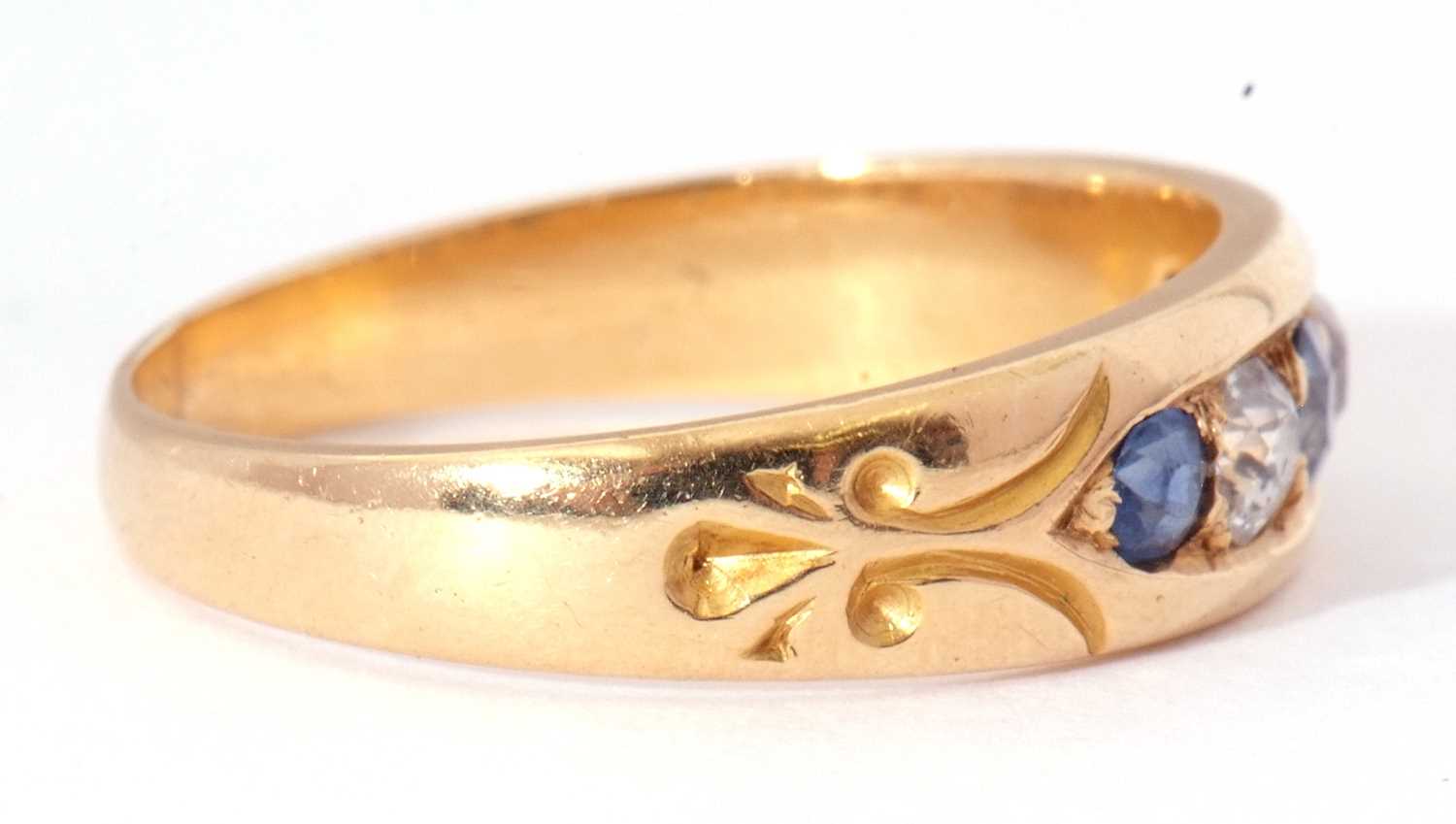 18ct gold sapphire and diamond ring, alternate set with three graduated sapphires and two round - Image 7 of 9