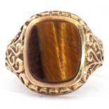 9ct gold cushion cut tiger's eye ring, 14 x 10mm, bezel set between carved scroll shoulders, size W,