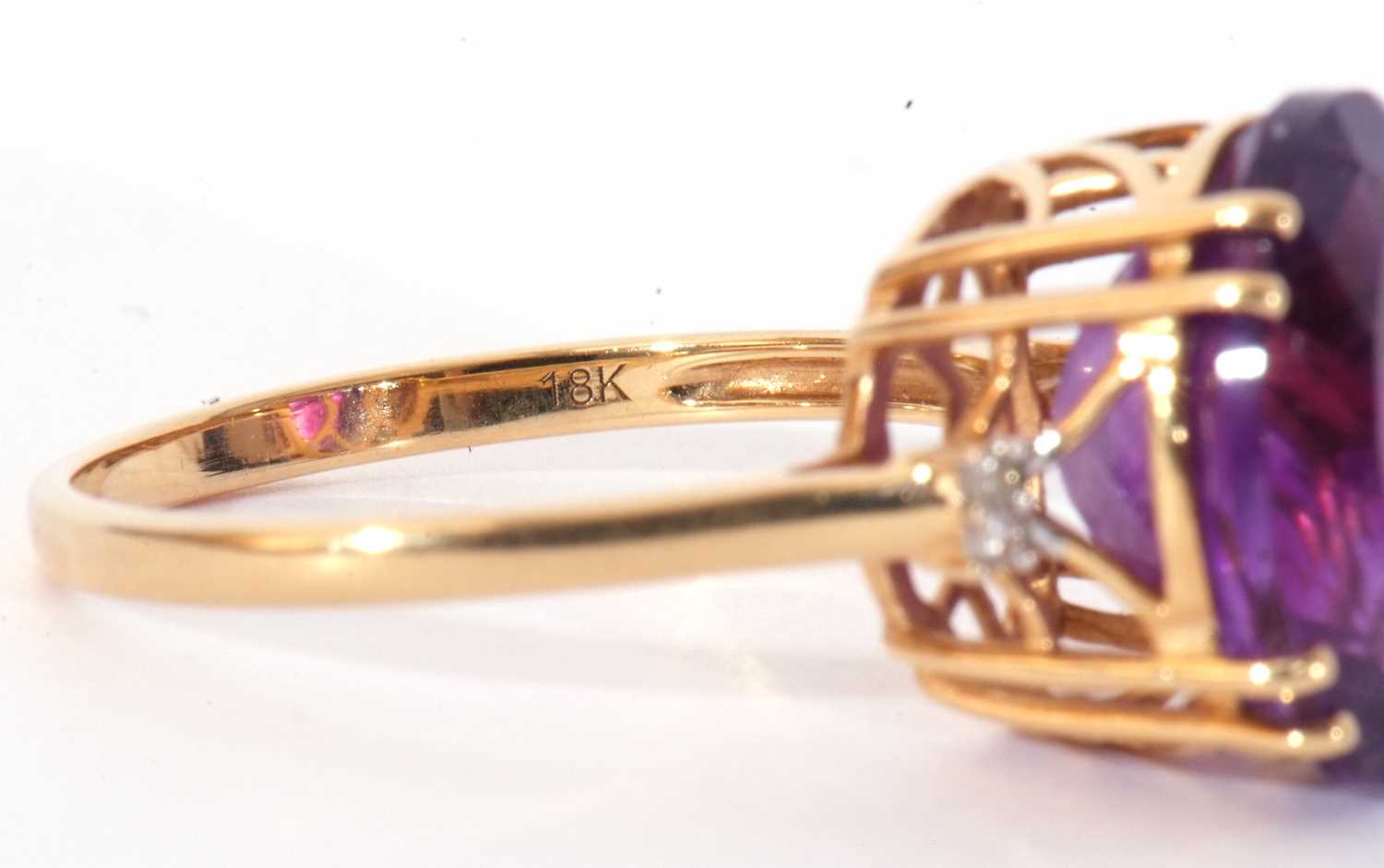 Modern 18ct gold, amethyst and diamond ring, the oval faceted amethyst four claw set and raised in a - Image 9 of 10