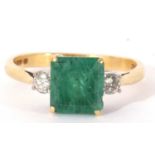 18ct gold emerald and diamond ring, the square cut emerald 7.64mm, between two small round brilliant