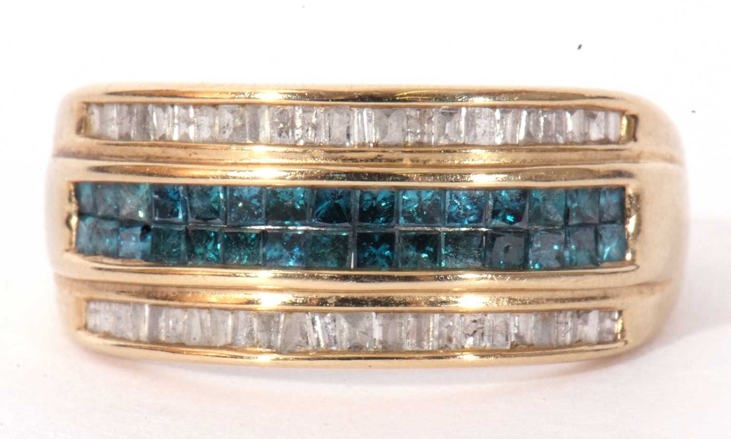 Modern 9ct gold diamond and light blue stone ring, a design with a central pave set blue stone