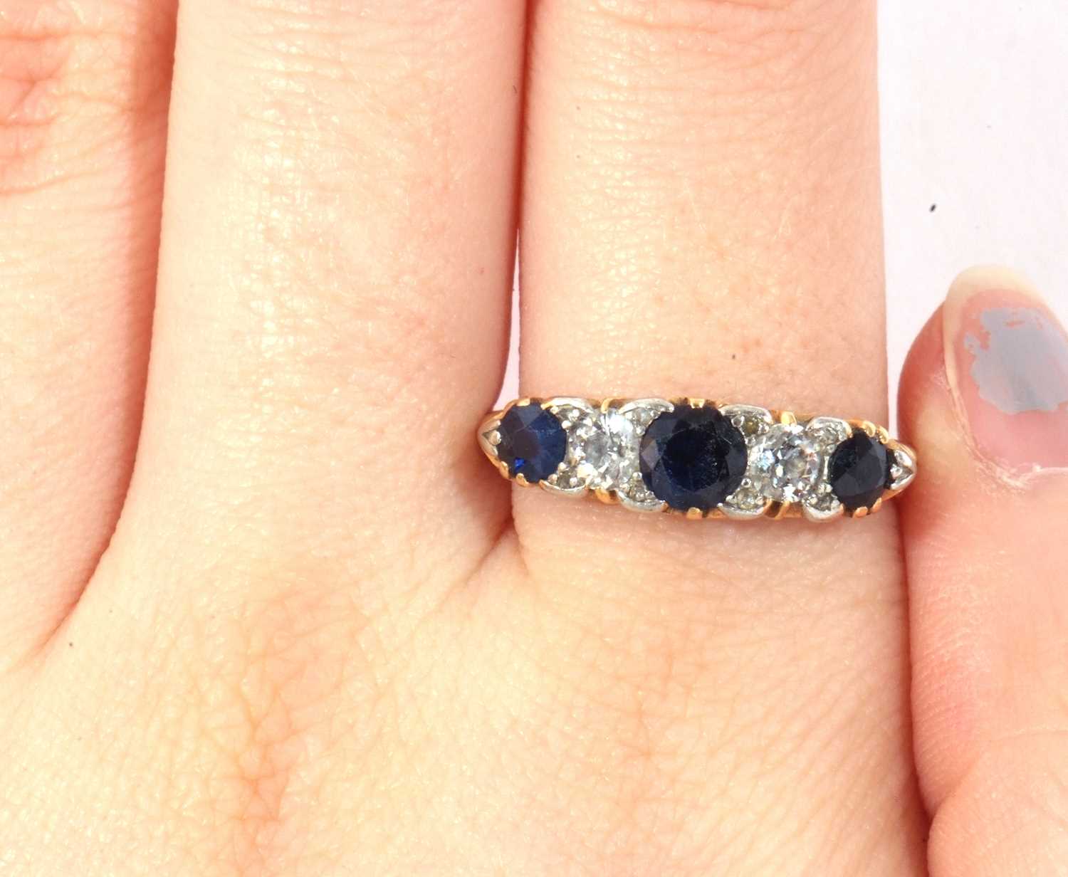 Sapphire and diamond ring featuring three round graduated sapphires and two round old cut - Image 9 of 11