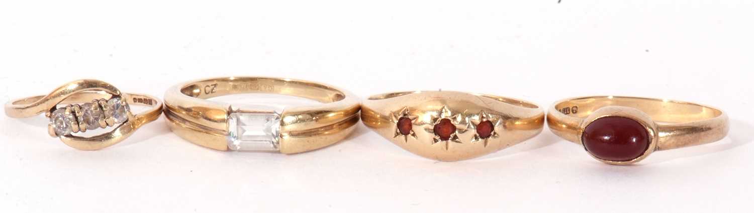 Mixed Lot: 9ct gold and cubic zirconia dress ring, a 9ct gold three stone garnet ring, a 9ct gold - Image 2 of 6