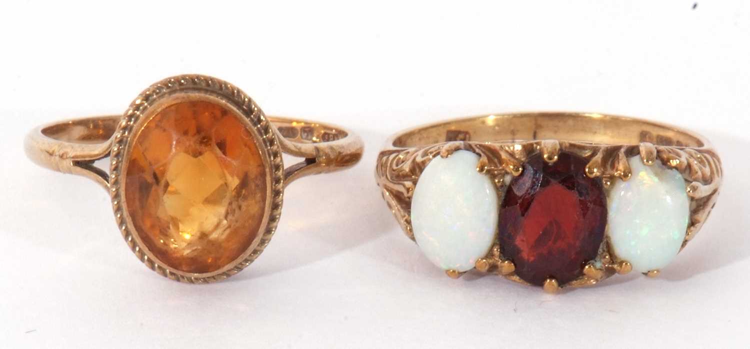 Mixed Lot: 9ct gold and citrine ring, 9ct gold garnet and white opal three stone ring, together with - Image 7 of 8