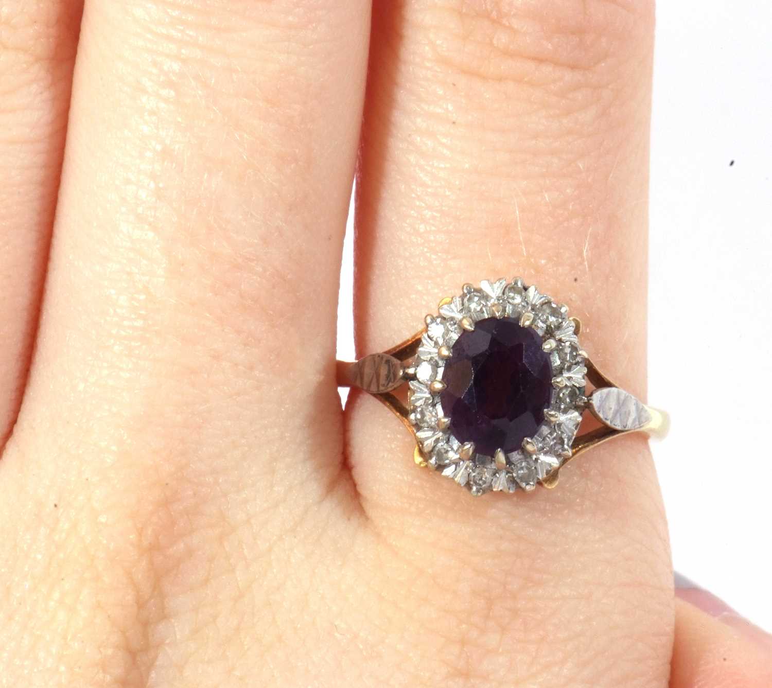 Amethyst and diamond cluster ring, the oval faceted amethyst raised within a small single cut - Image 9 of 9