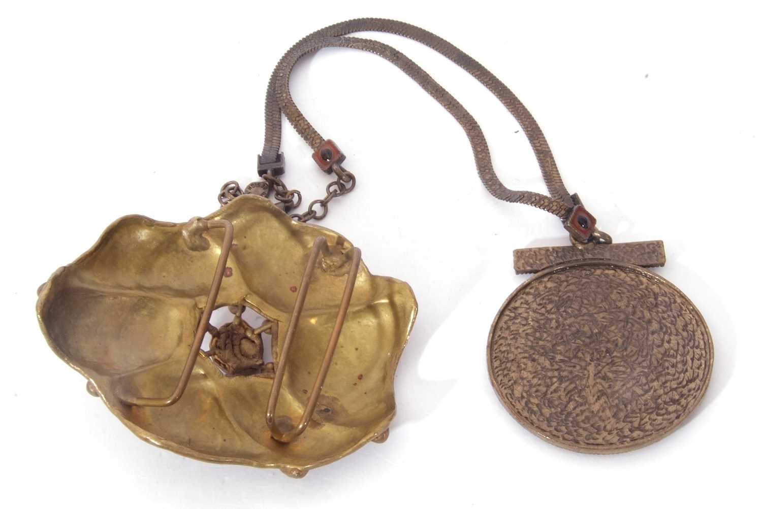 Mixed Lot: an unusual large metal lily pad buckle, together with a circular religious pendant - Image 2 of 2