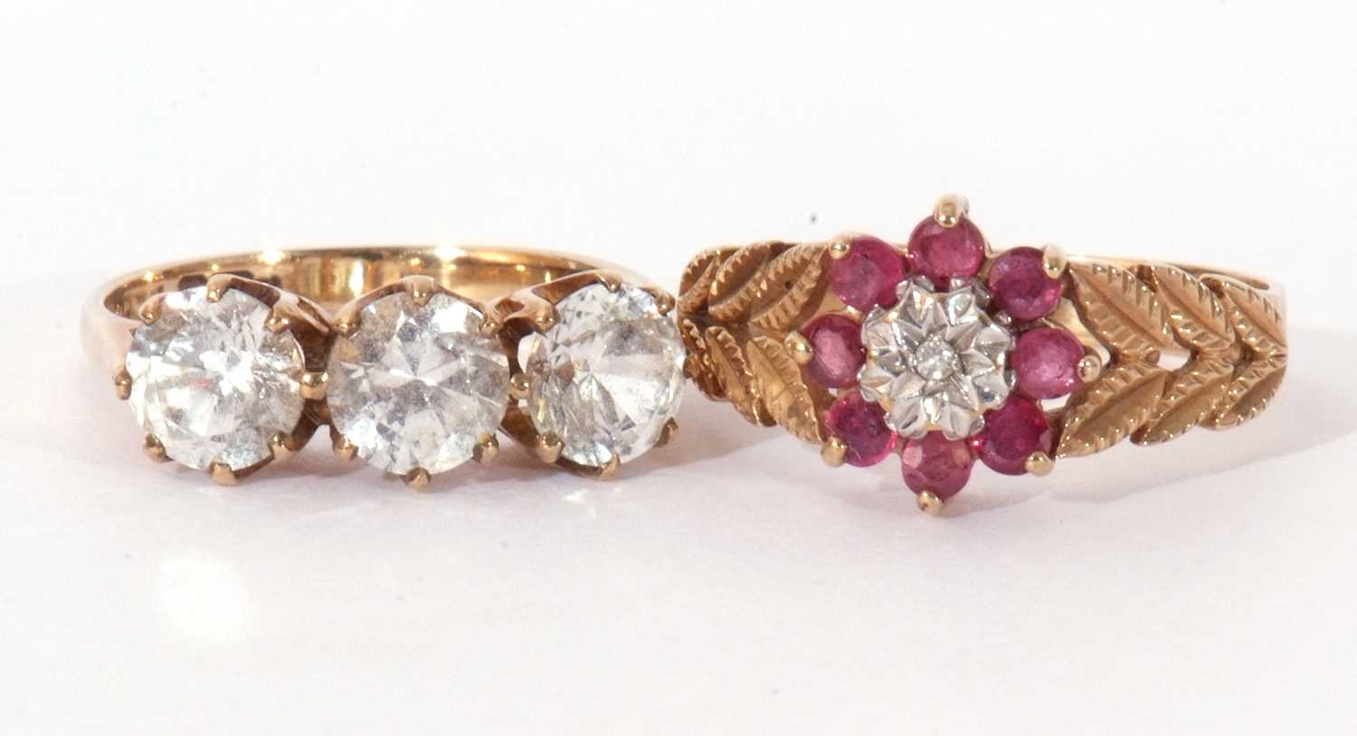 Mixed Lot: 9ct gold, ruby and diamond cluster ring, flower head design centring a small diamond in