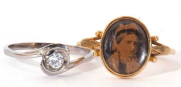 Mixed Lot: yellow metal ring, the oval glazed panel with photographic image below, unmarked, size O,