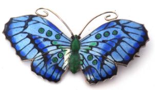 Art Nouveau enamel and silver butterfly brooch, the outstretched wings decorated in blues, green and