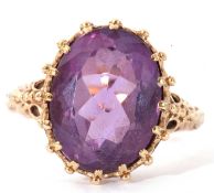 Large amethyst dress ring, the oval faceted amethyst 12 x 10mm, multi-claw set in a bead and pierced