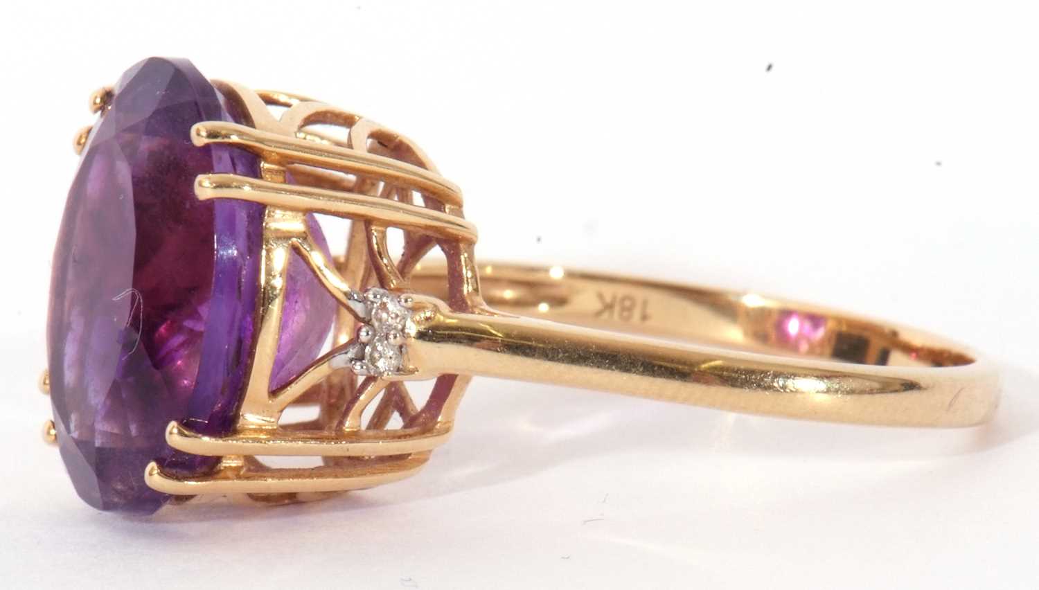 Modern 18ct gold, amethyst and diamond ring, the oval faceted amethyst four claw set and raised in a - Image 3 of 10