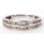 Modern diamond set half hoop ring, a design featuring two bands of channel set small round and