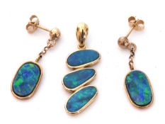 Mixed Lot: pair of modern opal earrings of oval shape, 13 x 8mm, framed and enclosed in 375