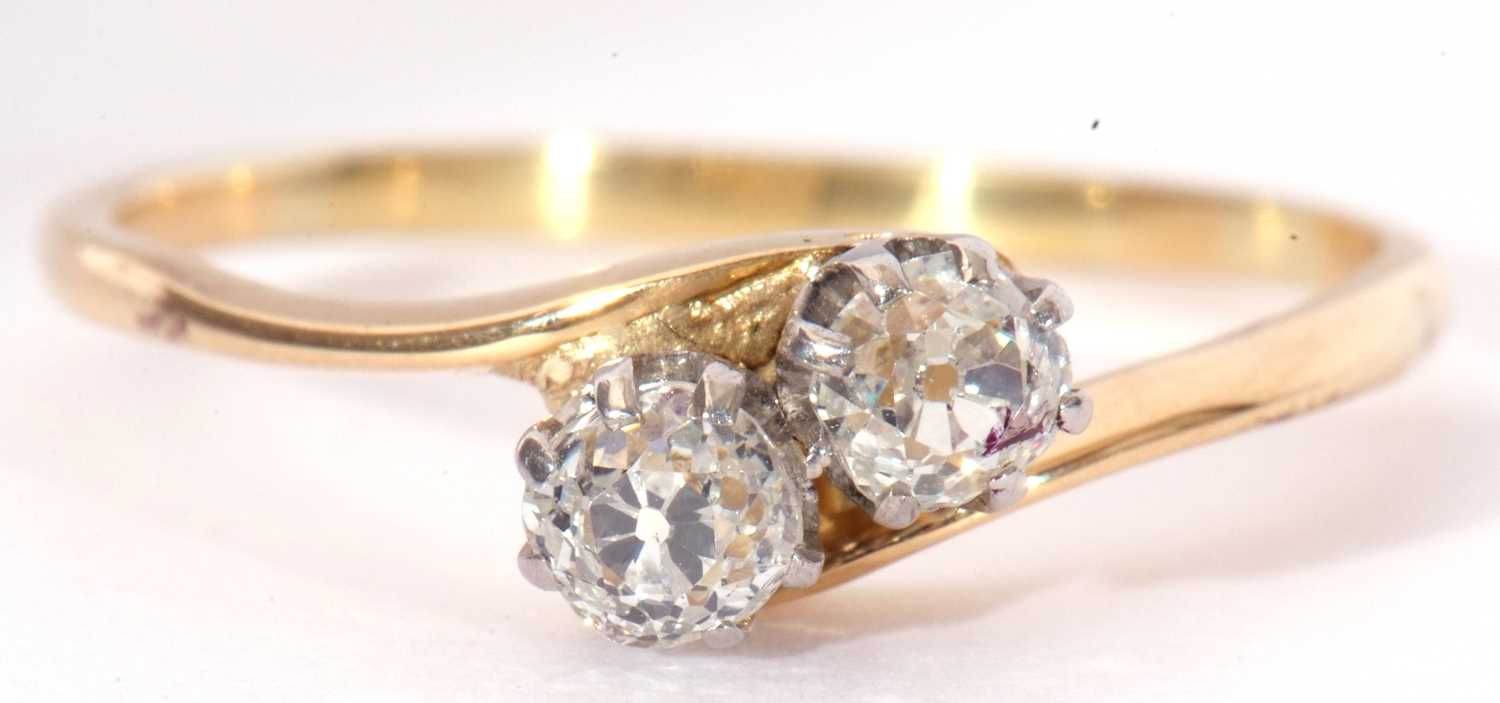 Two stone diamond cross-over ring featuring two old cut diamonds, 0.30ct approx, raised between - Image 3 of 7