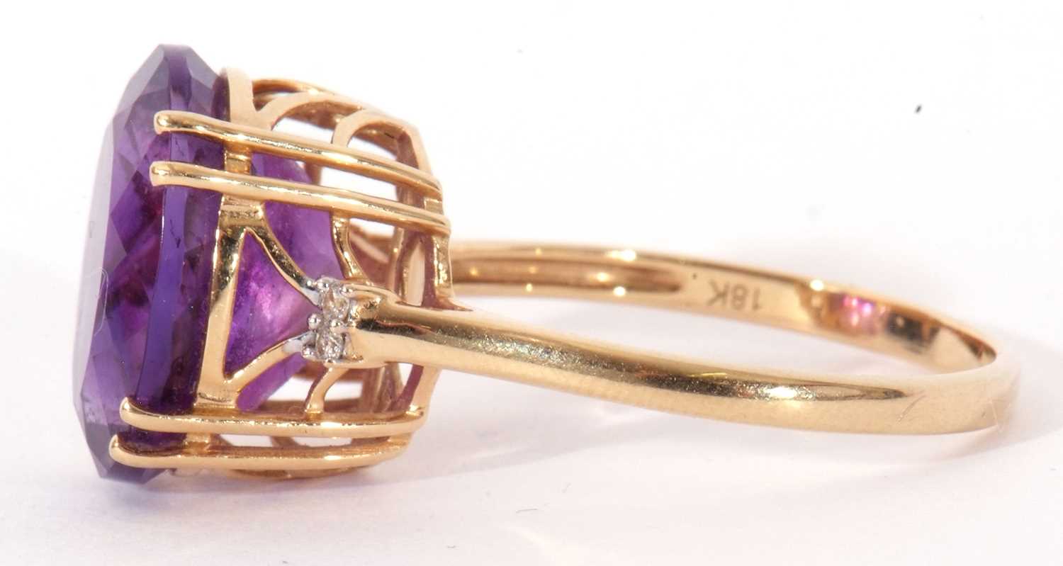 Modern 18ct gold, amethyst and diamond ring, the oval faceted amethyst four claw set and raised in a - Image 4 of 10