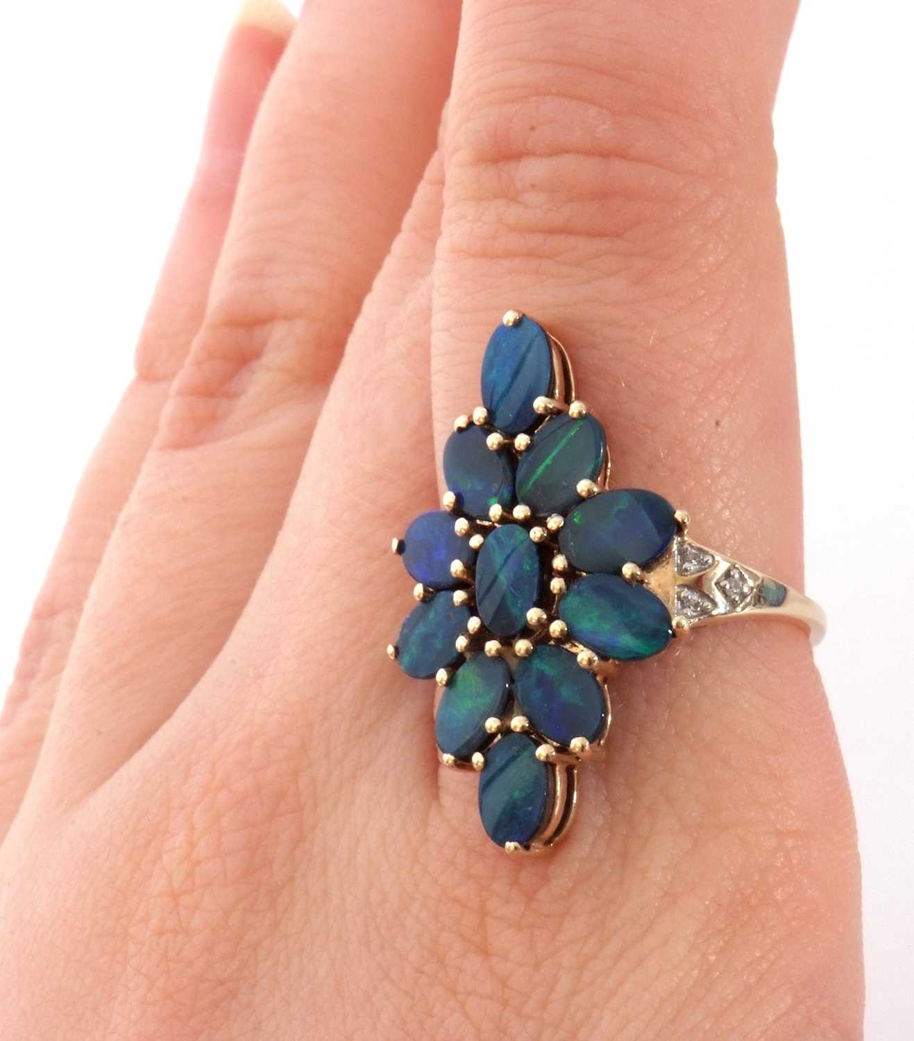 Modern 9ct gold black opal doublet dress ring, a lozenge design set with 11 opals, raised between - Image 10 of 10