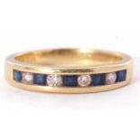 Diamond and sapphire half hoop ring, alternate channel set with four round brilliant cut diamonds,