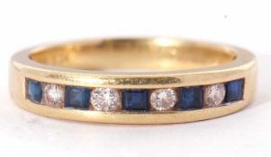 Diamond and sapphire half hoop ring, alternate channel set with four round brilliant cut diamonds,