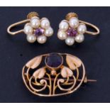 Mixed Lot: Art Nouveau style amethyst open work brooch, the oval faceted amethyst in millegrain