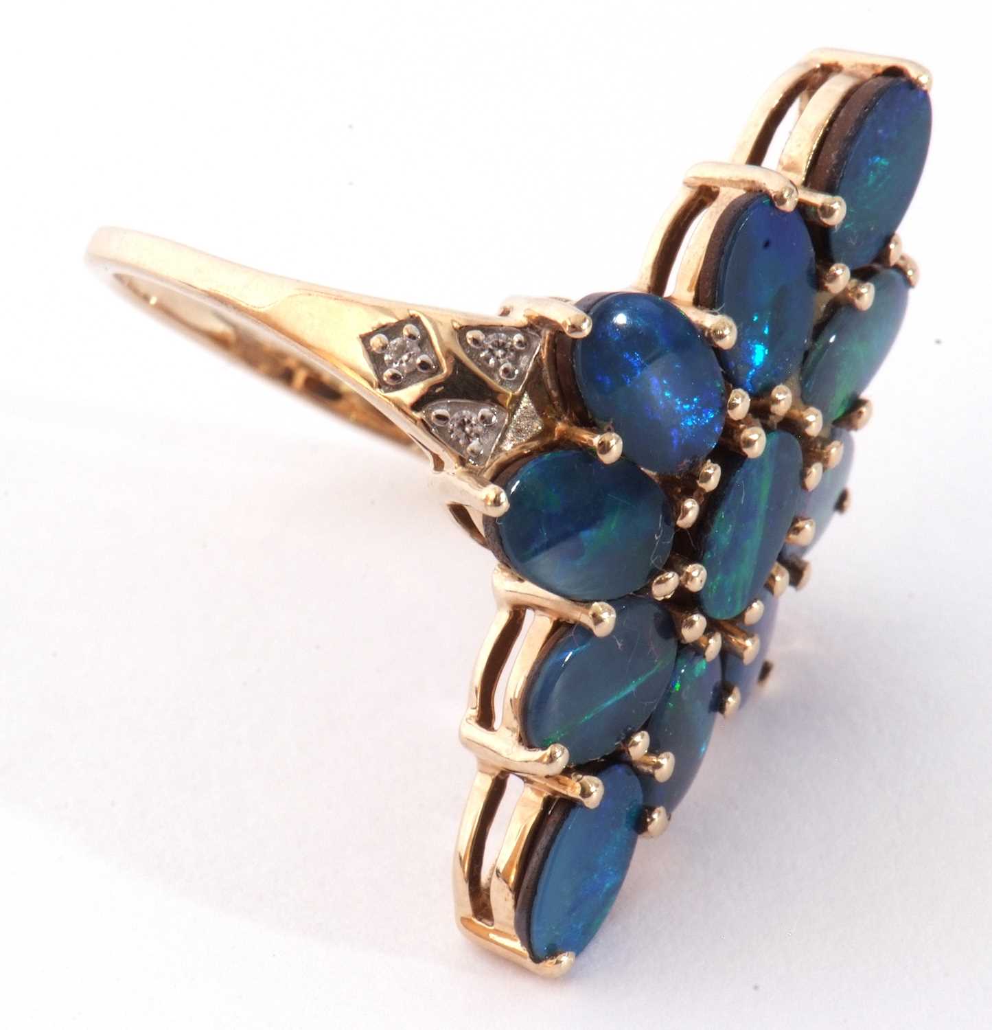 Modern 9ct gold black opal doublet dress ring, a lozenge design set with 11 opals, raised between - Image 5 of 10