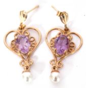 Pair of yellow metal, amethyst and seed pearl earrings, an open work design centring a small pale