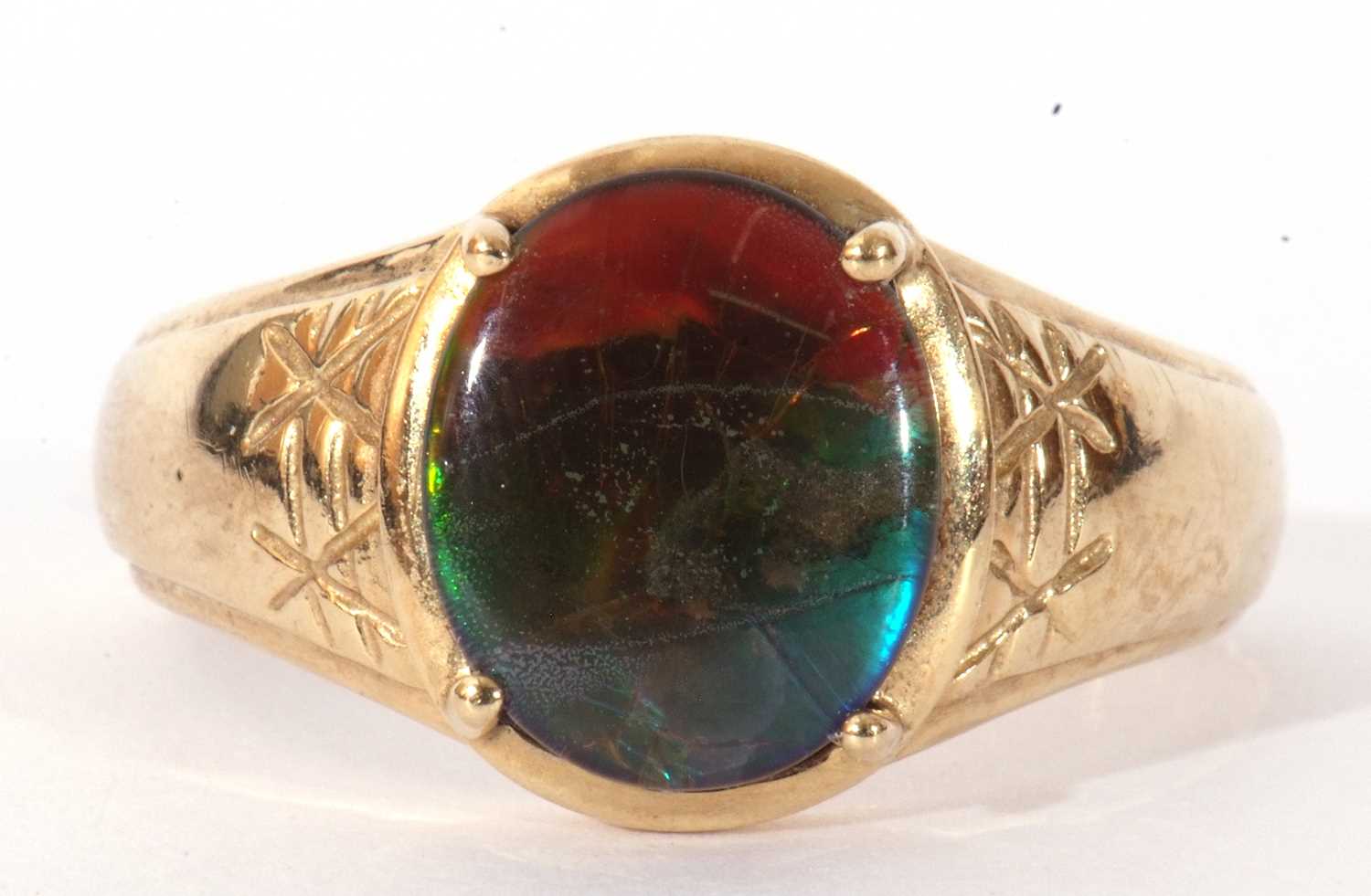 Modern 9ct gold and iridescent stone ring, the oval cut iridescent stone four claw set between - Image 2 of 9