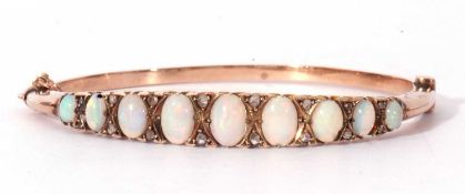 Antique opal and diamond hinge bracelet, the top section raised with nine oval graduated cabochon