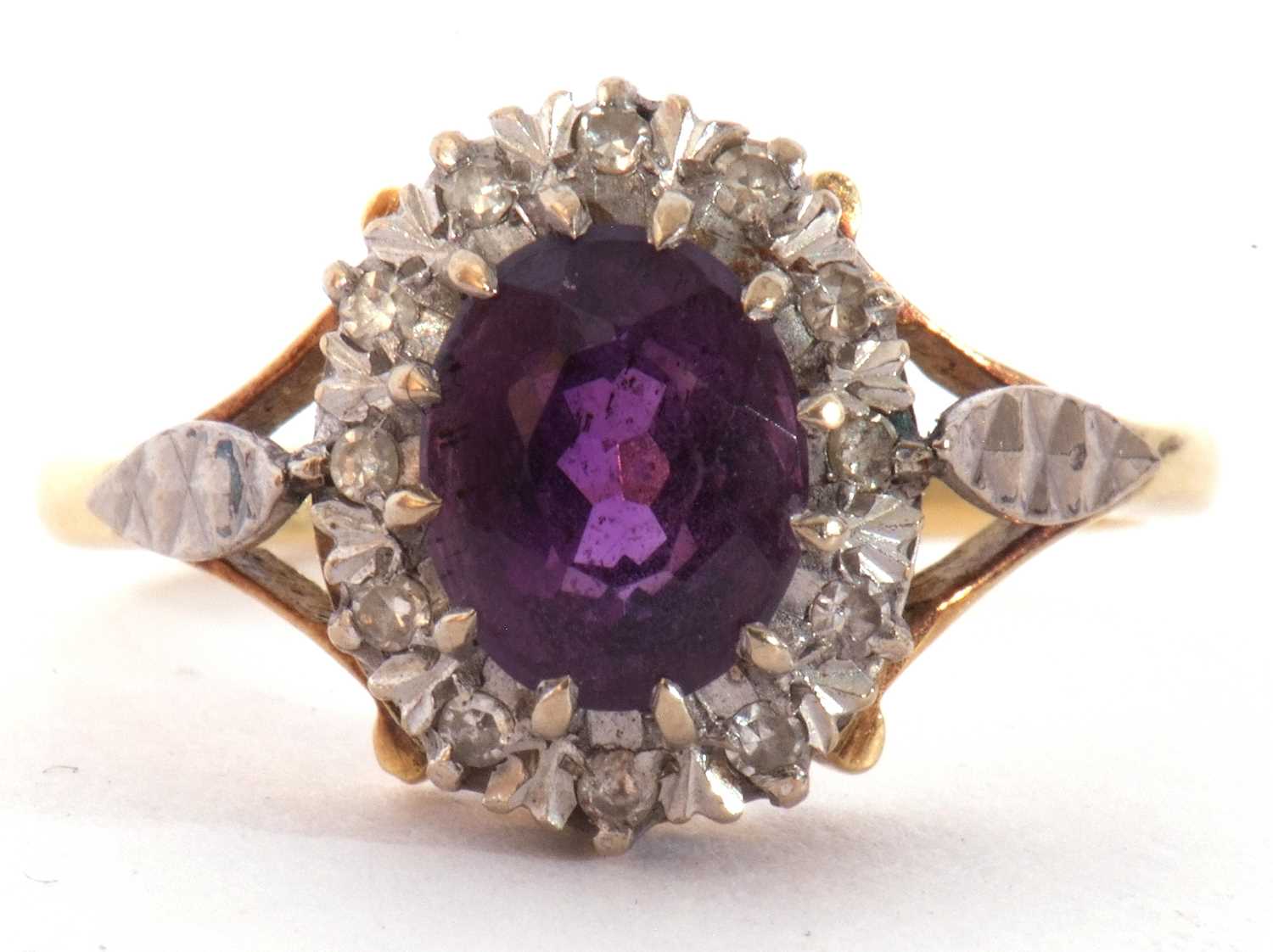 Amethyst and diamond cluster ring, the oval faceted amethyst raised within a small single cut - Image 3 of 9