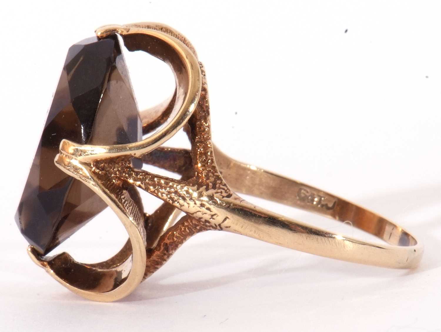 9ct gold smoky quartz dress ring, the large oval faceted quartz cardinal set in a stylised mount, - Image 3 of 9
