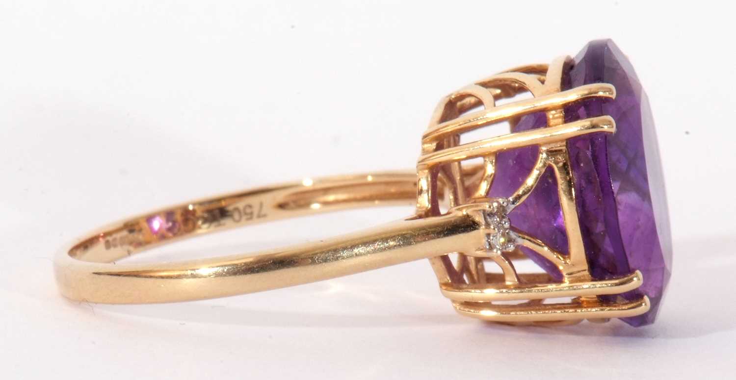 Modern 18ct gold, amethyst and diamond ring, the oval faceted amethyst four claw set and raised in a - Image 7 of 10