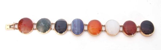 Late 19th/early 20th century 9ct gold framed eight stone harlequin agate panel bracelet, 18cm long