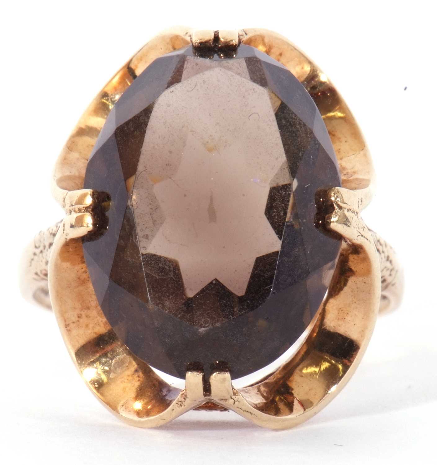 9ct gold smoky quartz dress ring, the large oval faceted quartz cardinal set in a stylised mount, - Image 2 of 9