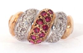 9ct gold ruby and diamond ring, the centre with a band of 10 small rubies between bands of small