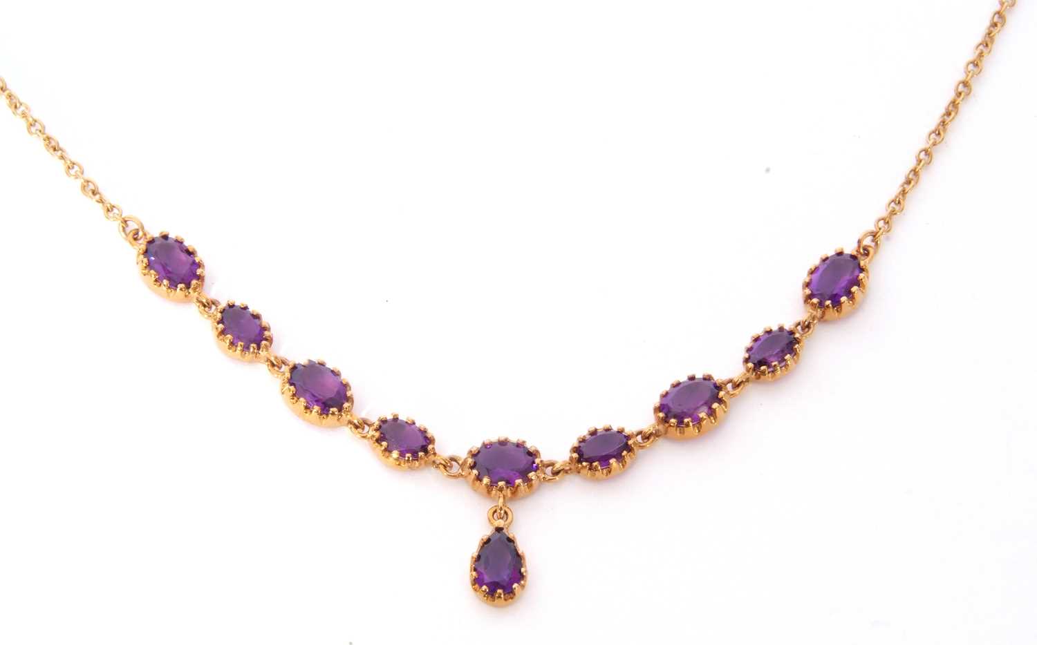 Modern amethyst necklace, a design featuring nine graduated oval cut amethysts in multi-claw cut - Image 2 of 3