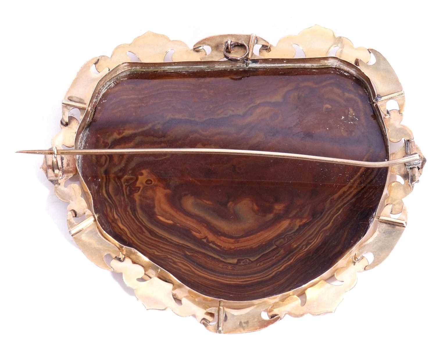 Large agate brooch, the brown agate panel with bevel cut edges, framed in an ornate metal shield and - Image 2 of 2