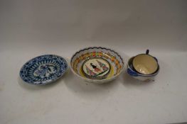 MIXED LOT VARIOUS QUIMPER BOWLS, CUPS AND A FURTHER DAMAGED IZNIK PLATE