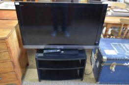 SONY FLATSCREEN TV WITH STAND