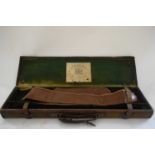VINTAGE CANVAS COVERED GUN CASE MARKED 'JOHN RIGBY & CO, ST JAMES STREET, LONDON'