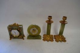 TWO ALABASTER MOUNTED MANTEL CLOCKS AND SIMILAR PAIR OF CANDLESTICKS