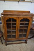 EARLY 20TH CENTURY OAK BOOKCASE CABINET WITH GLAZED DOORS, 91CM WIDE