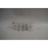 MIXED LOT NINE VARIOUS SMALL GLASS WINES AND SPIRIT GLASSES, SOME WITH ENGRAVED DECORATION