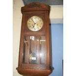 EARLY 20TH CENTURY OAK CASED WALL CLOCK