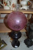 DARK GLASS BASED OIL LAMP WITH CRANBERRY TINTED SHADE