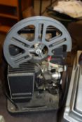 BELL & HOWELL AUTOLOAD PROJECTOR WITH STAND