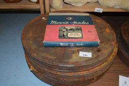 THREE METAL CASES OF FILM REELS, PLUS A FURTHER FILM REEL 'THE SHORT GAME IN GOLF' (4)